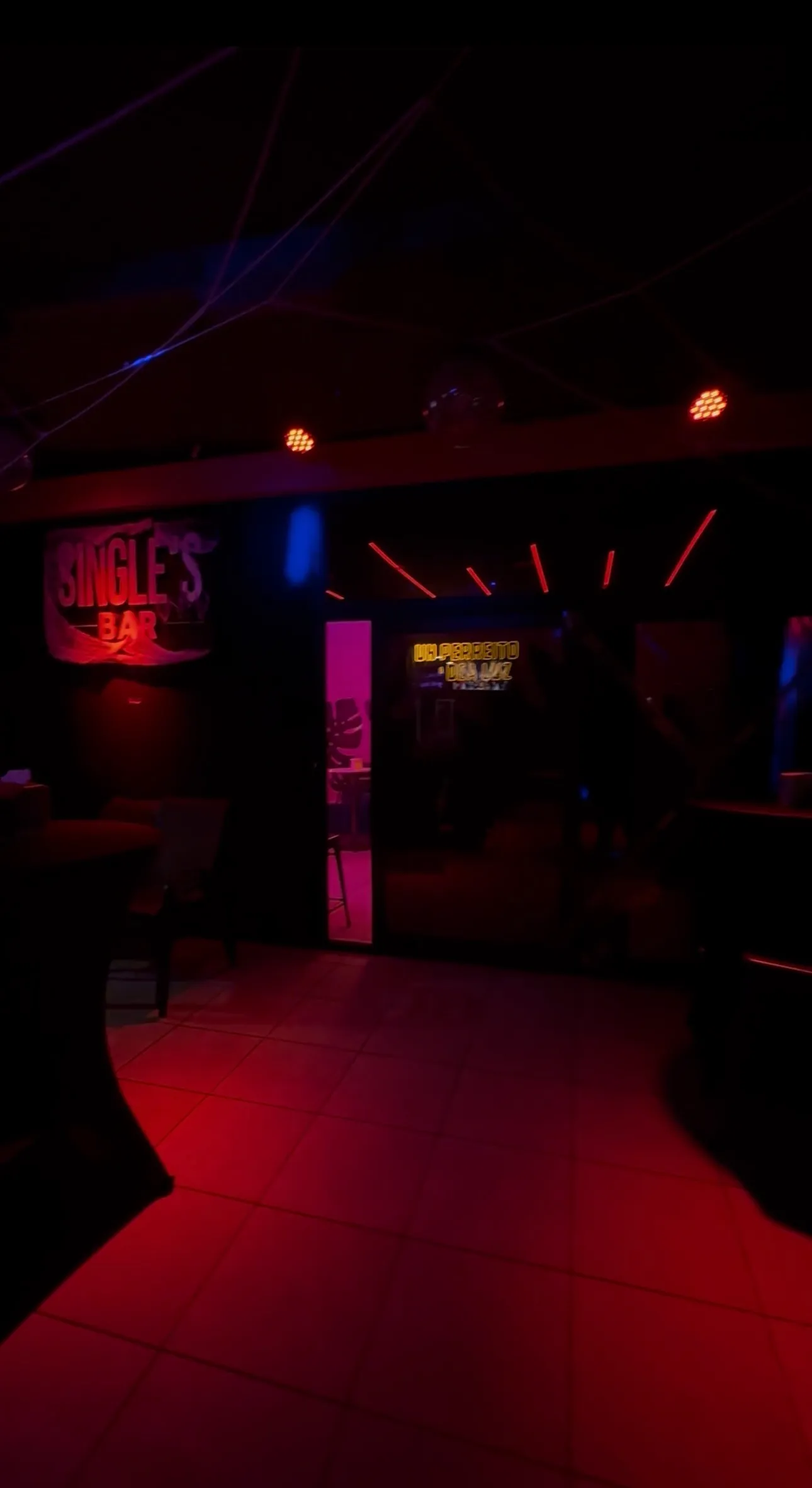Interior dance floor with red neon lights